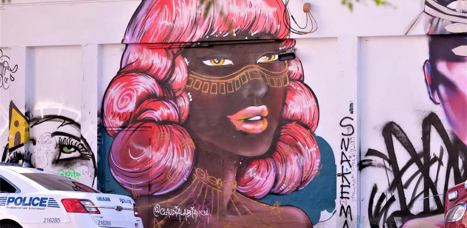 Vispea band performing with graffiti backdrop